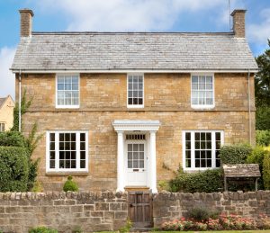 Period house with white aluminium windows