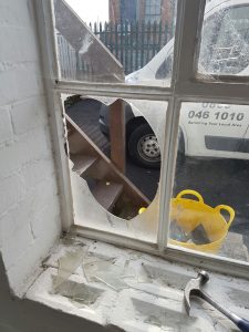 smashed glass window needing repairment